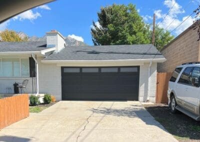 Front view of a black garage door